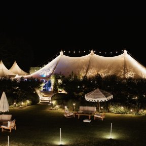 Flying festoons over marquee at night - DP Marquees Ltd